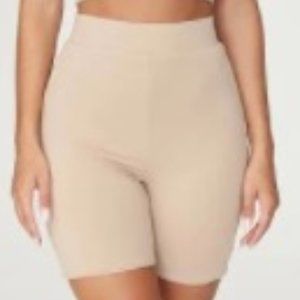 Fashion  Nova tan biker shorts medium.
